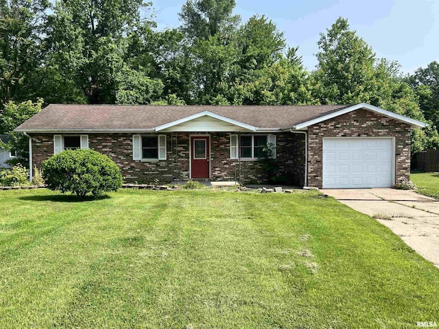 20 Suburban Dr, Murphysboro, IL 62966 - ranch-style house with concrete driveway, a front lawn, brick siding, and an attached garage