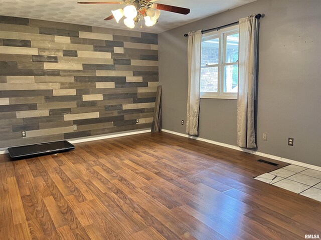 20 Suburban Dr, Murphysboro, IL 62966 - unfurnished room with ceiling fan and wood finished floors