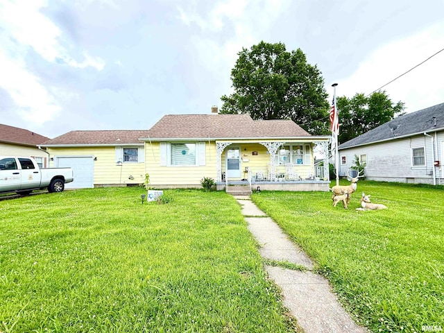 1313 N State St, Marion, IL 62959 - view of front of house featuring a porch, a garage, a front lawn, and a chimney