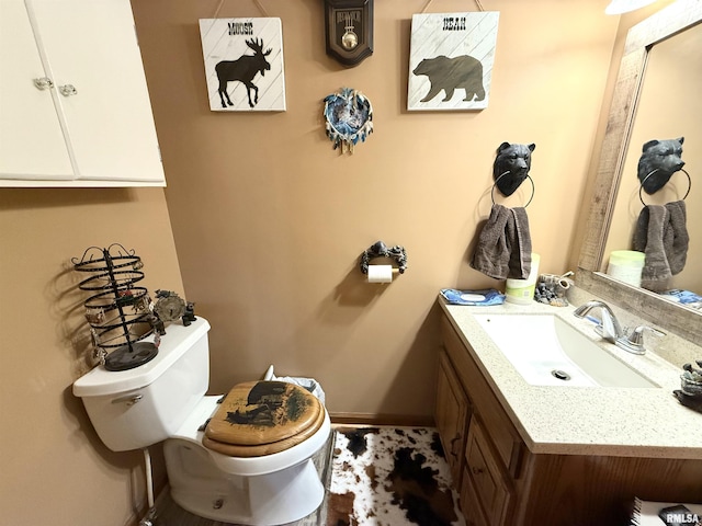 1313 N State St, Marion, IL 62959 - half bathroom featuring toilet and vanity
