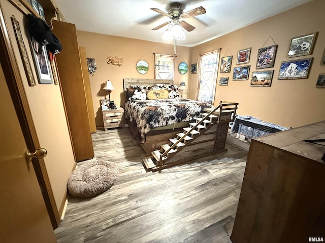 1313 N State St, Marion, IL 62959 - bedroom with wood finished floors and a ceiling fan