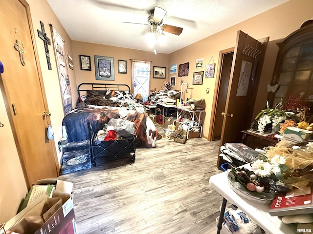 1313 N State St, Marion, IL 62959 - bedroom with wood finished floors and ceiling fan
