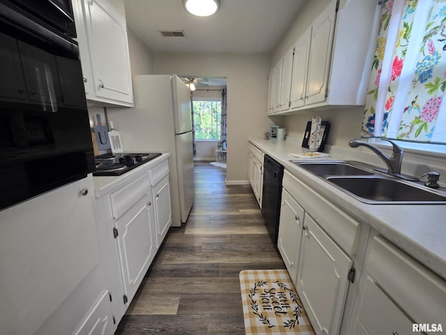 2805 College St, Mount Vernon, IL 62864 - kitchen featuring ceiling fan, black appliances, white cabinets, and light countertops