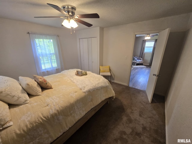 2805 College St, Mount Vernon, IL 62864 - bedroom featuring dark colored carpet, a closet, and ceiling fan