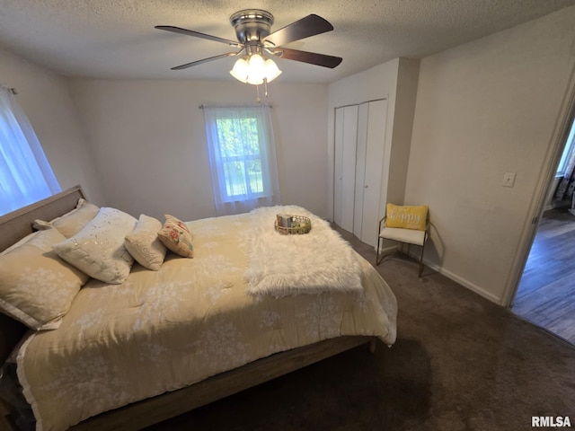 2805 College St, Mount Vernon, IL 62864 - bedroom featuring a textured ceiling, a closet, ceiling fan, and carpet floors