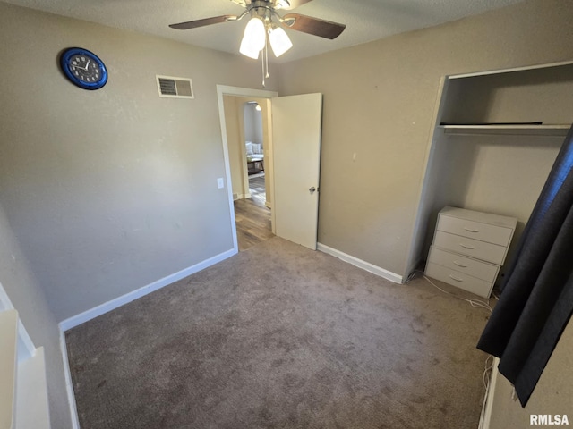 2805 College St, Mount Vernon, IL 62864 - unfurnished bedroom with carpet floors, a closet, and ceiling fan