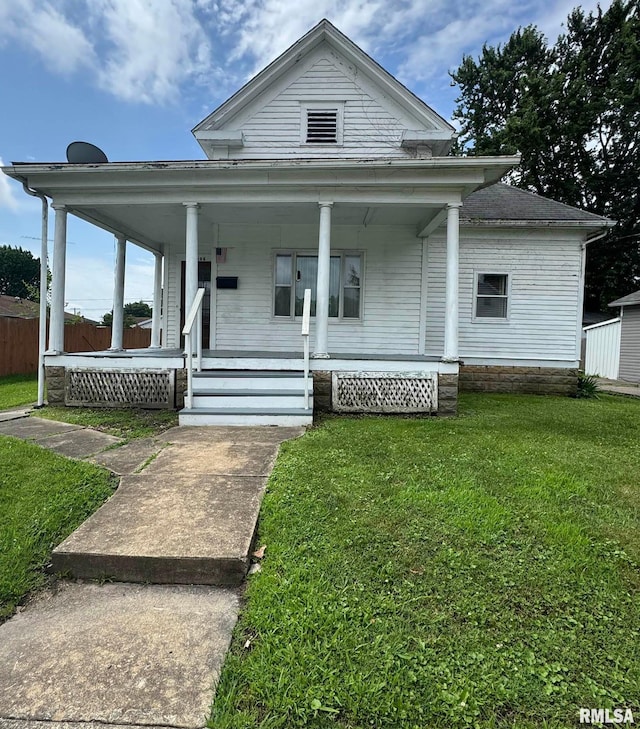 306 W Kaskaskia St, Pinckneyville, IL 62274 - view of front of home with a front yard and covered porch