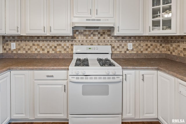 10 Monroe Ave, Salem, IL 62881 - kitchen with white gas range, under cabinet range hood, white cabinetry, and dark countertops