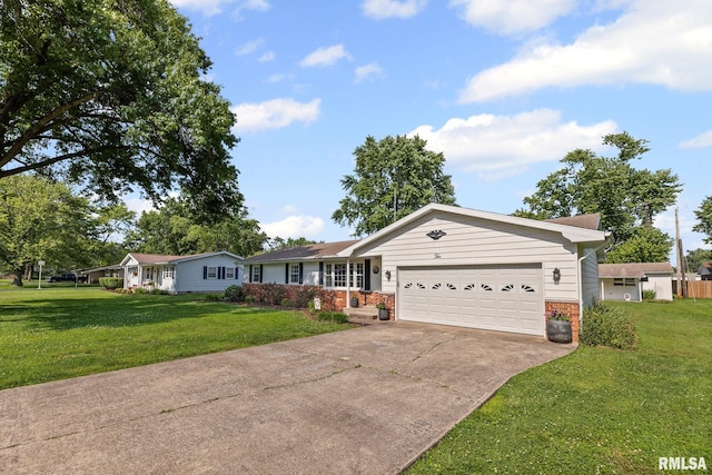 10 Monroe Ave, Salem, IL 62881 - ranch-style home with brick siding, a garage, concrete driveway, and a front lawn