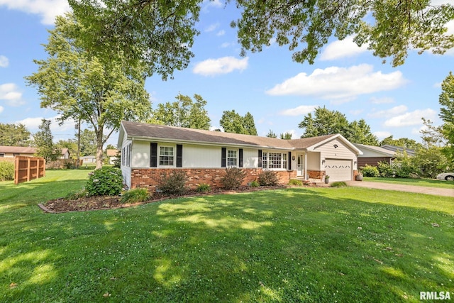 10 Monroe Ave, Salem, IL 62881 - ranch-style house featuring brick siding, an attached garage, driveway, and a front yard