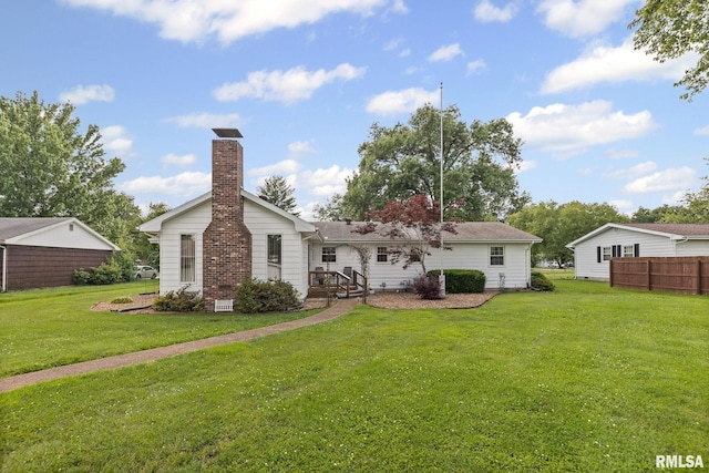 10 Monroe Ave, Salem, IL 62881 - rear view of property with a chimney