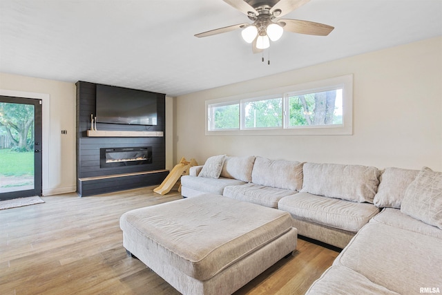 809 Dogwood Ln, Marion, IL 62959 - living area with a fireplace, light wood-style floors, and ceiling fan