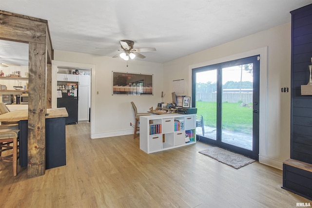 809 Dogwood Ln, Marion, IL 62959 - kitchen with freestanding refrigerator, light wood-type flooring, and ceiling fan