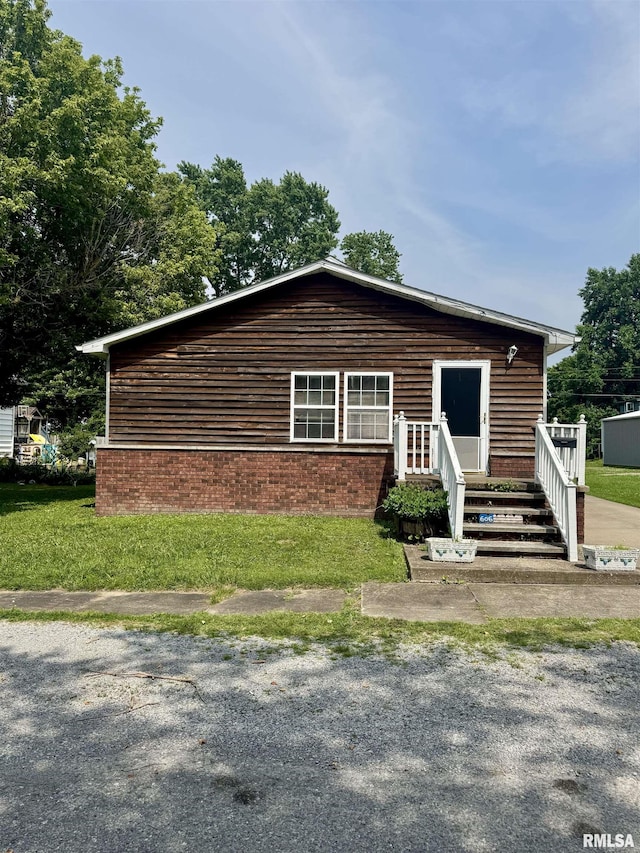 606 N Orchard St, West Frankfort, IL 62896 - view of front of home featuring brick siding