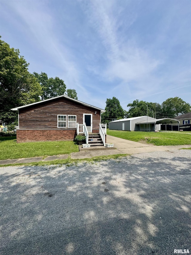 606 N Orchard St, West Frankfort, IL 62896 - view of front of property featuring a front lawn