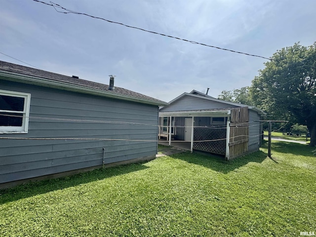 606 N Orchard St, West Frankfort, IL 62896 - back of house with a yard