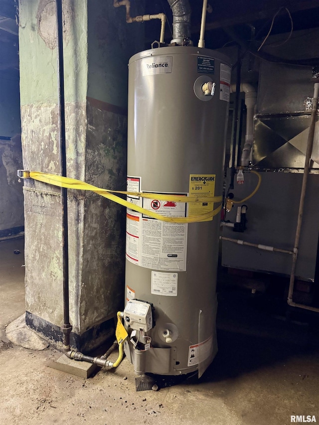 606 N Orchard St, West Frankfort, IL 62896 - utility room featuring gas water heater and heating unit
