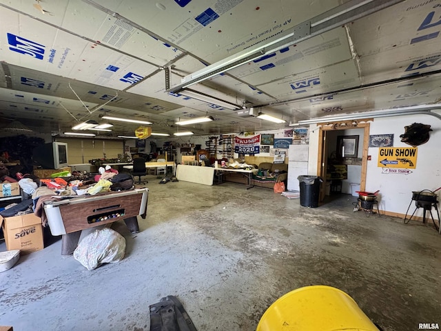 606 N Orchard St, West Frankfort, IL 62896 - garage with a workshop area and a garage door opener