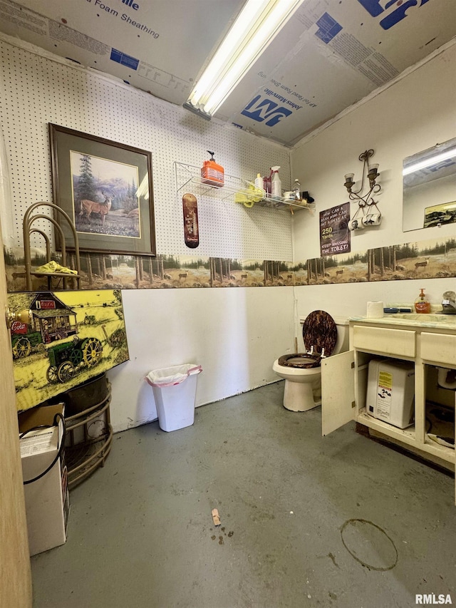 606 N Orchard St, West Frankfort, IL 62896 - bathroom featuring concrete flooring and vanity