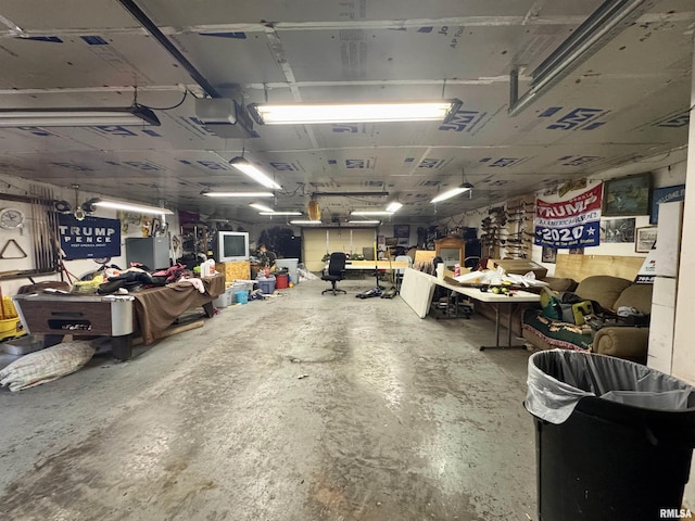 606 N Orchard St, West Frankfort, IL 62896 - garage with a workshop area and a garage door opener