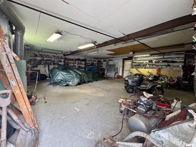 606 N Orchard St, West Frankfort, IL 62896 - garage featuring a workshop area