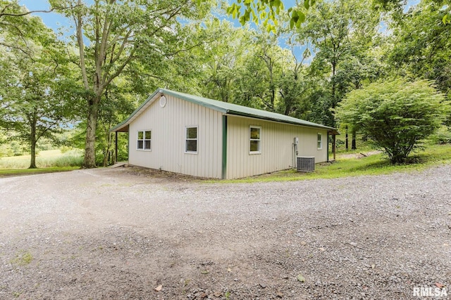 880 State Route 166, Creal Springs, IL 62922 - view of home's exterior featuring gravel driveway and view of wooded area