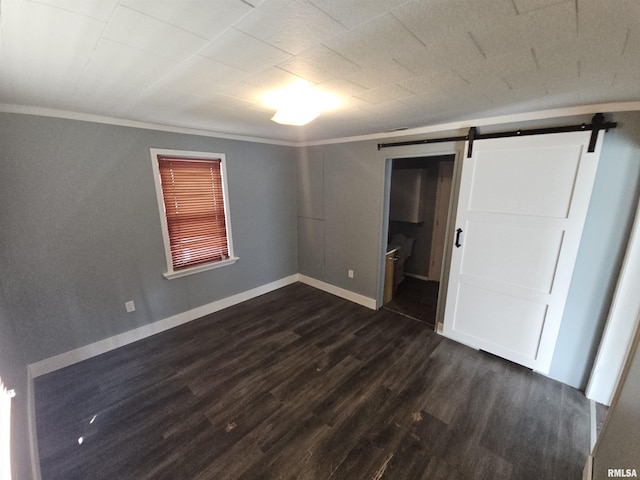 2508 Forest Ave, Mount Vernon, IL 62864 - unfurnished bedroom with dark wood finished floors, a barn door, and ornamental molding