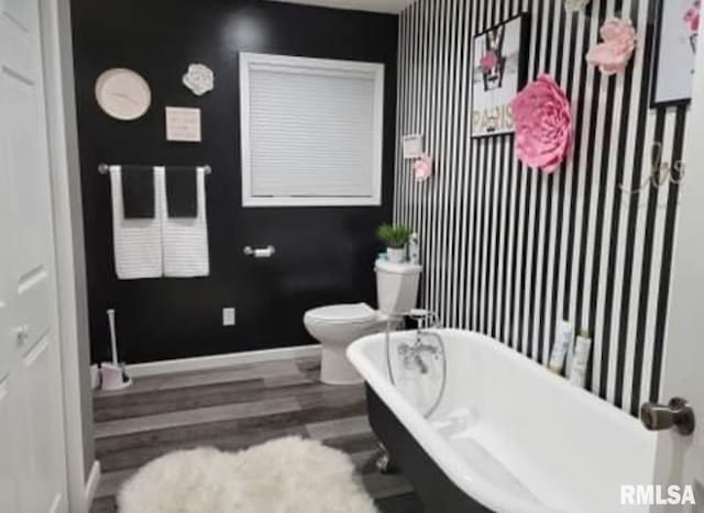 506 S Kentucky St, Benton, IL 62812 - bathroom with a soaking tub and wood finished floors