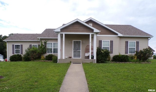 1821 Mark Dr, Sparta, IL 62286 - view of front of home featuring a front lawn and roof with shingles