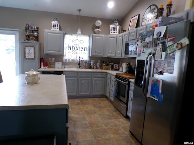 1821 Mark Dr, Sparta, IL 62286 - kitchen with stainless steel appliances, healthy amount of natural light, light countertops, and hanging light fixtures