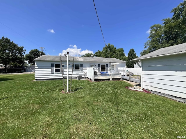 1205 W Bennett St, Salem, IL 62881 - back of house with a lawn and a wooden deck