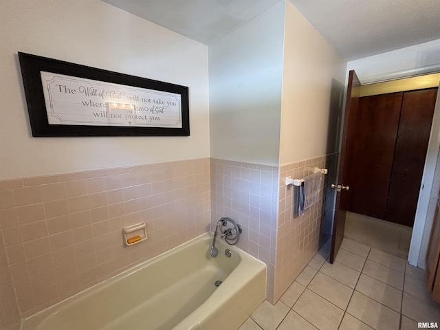 49 Jon St, Metropolis, IL 62960 - full bath with tile patterned floors, a garden tub, and tile walls