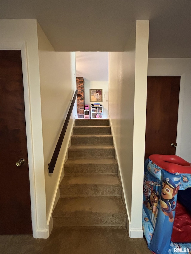 49 Jon St, Metropolis, IL 62960 - staircase featuring carpet flooring