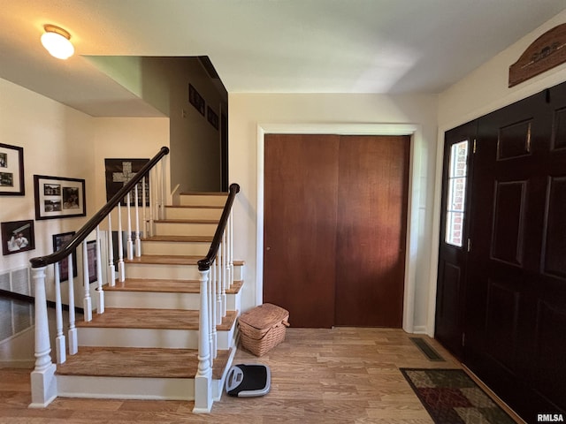 49 Jon St, Metropolis, IL 62960 - entrance foyer with wood finished floors and stairs