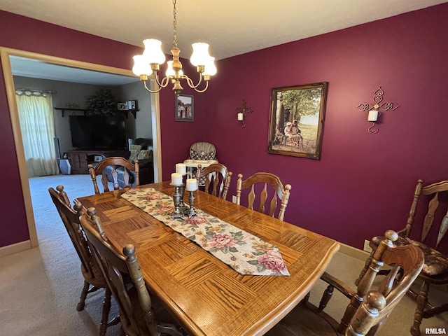 49 Jon St, Metropolis, IL 62960 - carpeted dining space featuring a chandelier