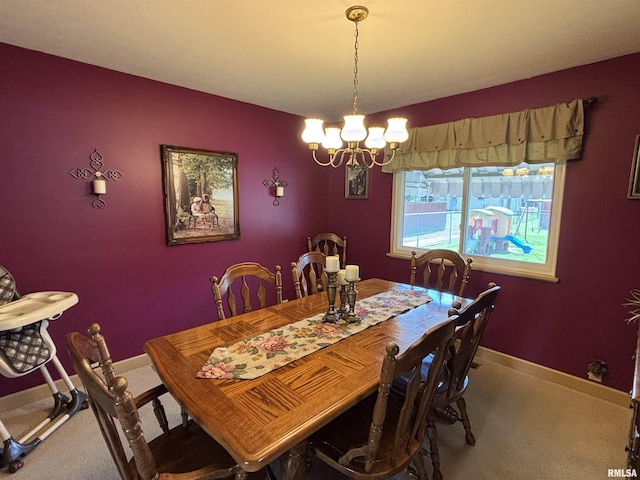 49 Jon St, Metropolis, IL 62960 - dining room with a chandelier and carpet flooring