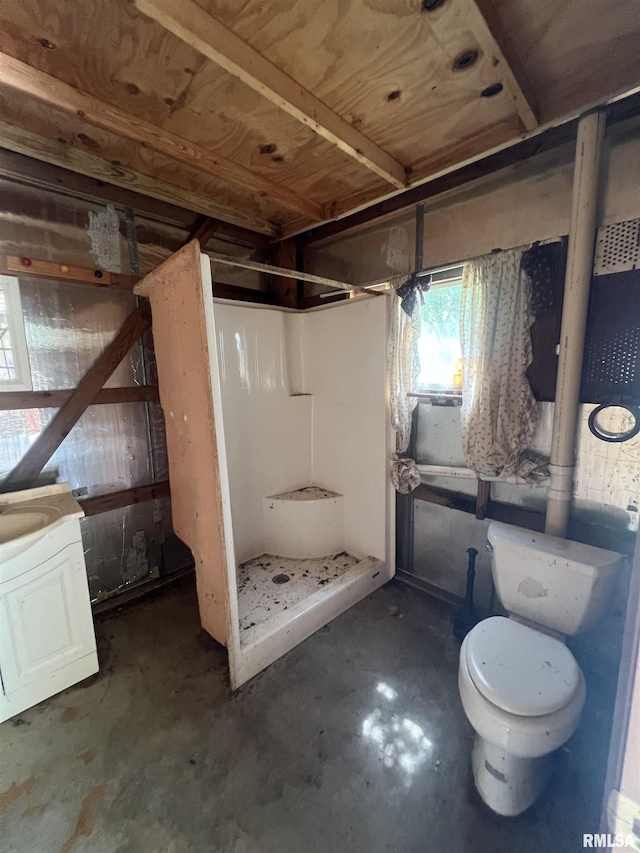 18640 Mount Zion Rd, Benton, IL 62812 - full bathroom with a shower stall, concrete floors, and vanity