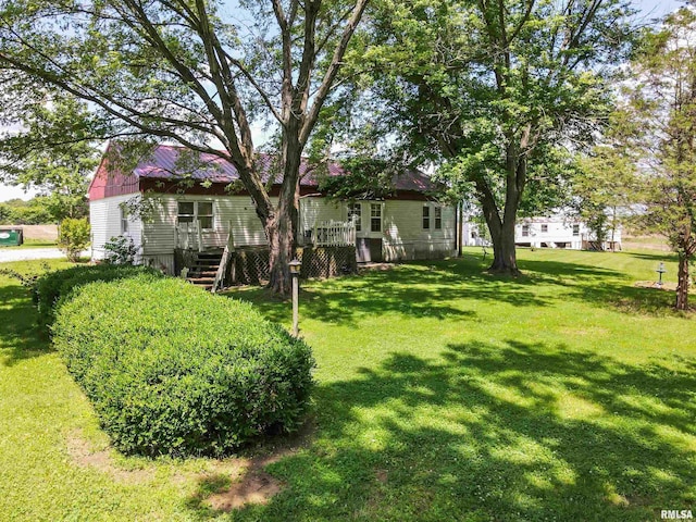 735 Sharp Rd, Anna, IL 62906 - view of green lawn with a wooden deck