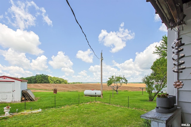 735 Sharp Rd, Anna, IL 62906 - view of green lawn featuring a shed and a rural view