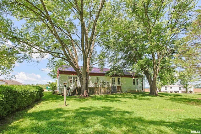 735 Sharp Rd, Anna, IL 62906 - view of grassy yard with a wooden deck