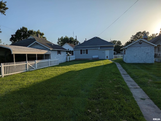 1205 Burgess Ave, Johnston City, IL 62951 - view of yard at dusk