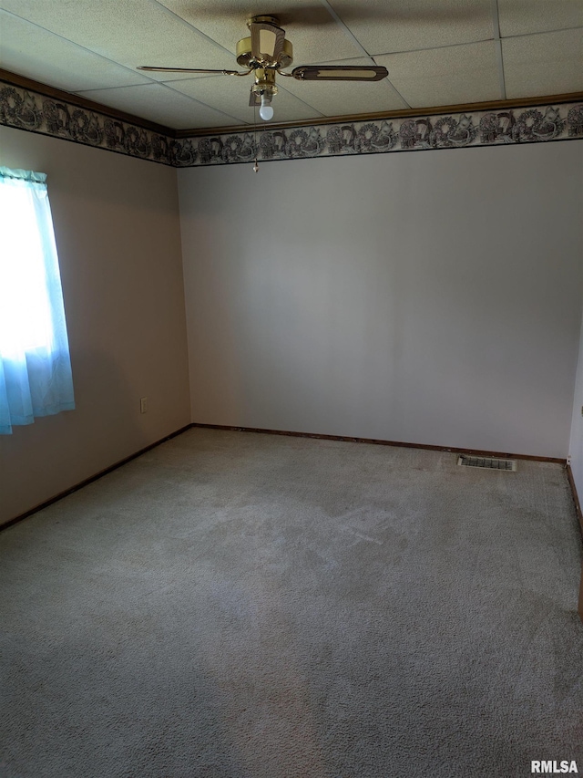 1205 Burgess Ave, Johnston City, IL 62951 - unfurnished room with ceiling fan and light carpet