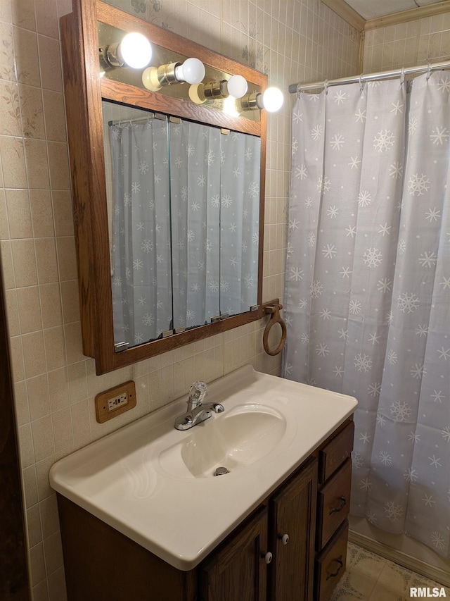 1205 Burgess Ave, Johnston City, IL 62951 - bathroom with vanity and tile walls