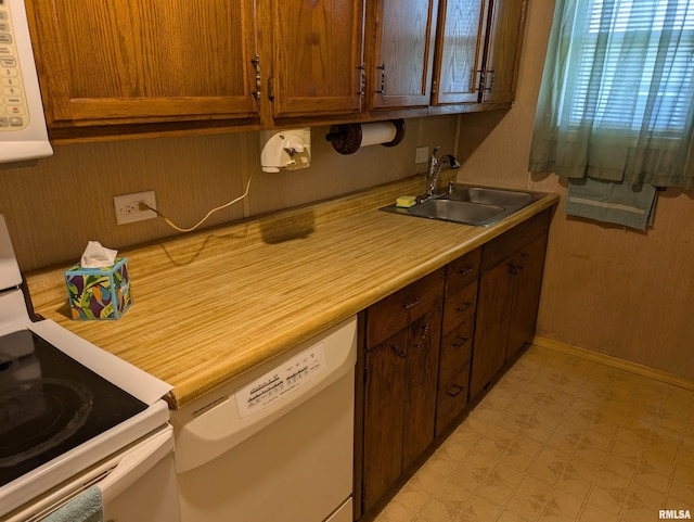 1205 Burgess Ave, Johnston City, IL 62951 - kitchen featuring white appliances, light countertops, and light floors