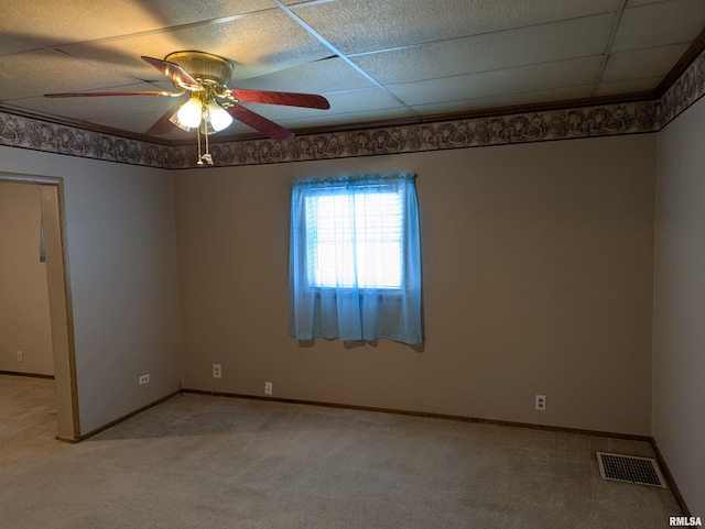 1205 Burgess Ave, Johnston City, IL 62951 - empty room featuring a ceiling fan and light carpet