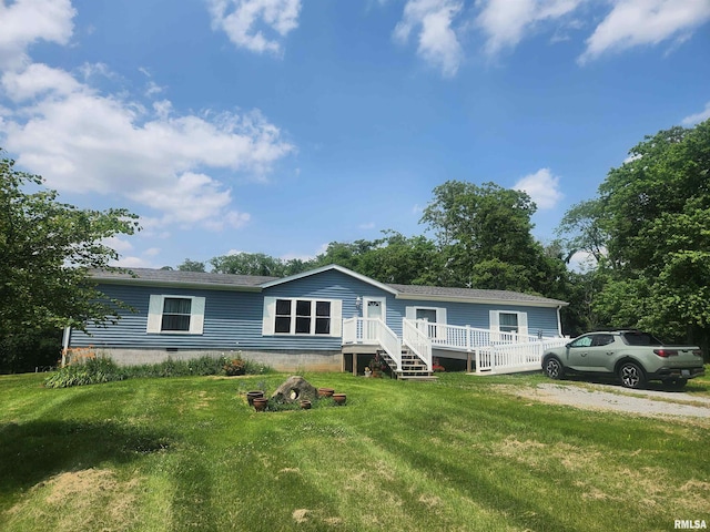 8747 Old State Route 14th Rte, Duquoin, IL 62832 - manufactured / mobile home featuring a front yard, a wooden deck, and crawl space