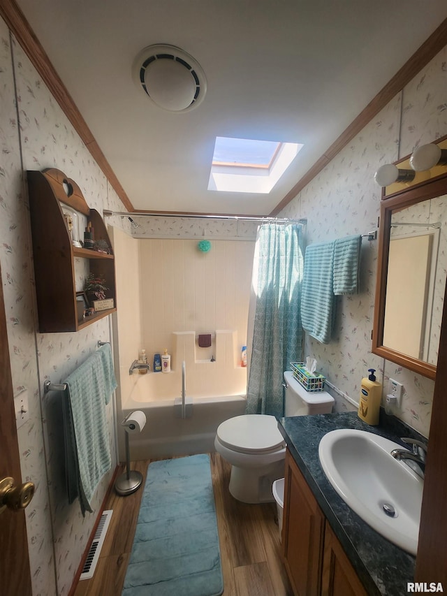 8747 Old State Route 14th Rte, Duquoin, IL 62832 - bathroom with wallpapered walls, a skylight, wood finished floors, crown molding, and vanity