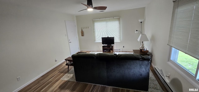 308 Blossom St, Carterville, IL 62918 - living room with ceiling fan, baseboard heating, dark wood-style flooring, a baseboard radiator, and a desk