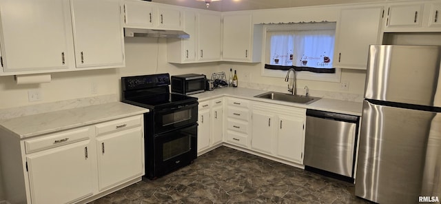 308 Blossom St, Carterville, IL 62918 - kitchen with black appliances, under cabinet range hood, white cabinets, and light stone countertops