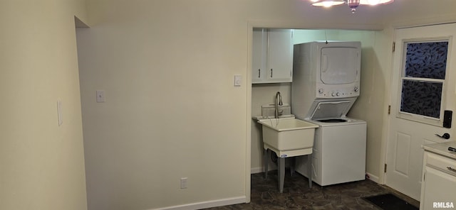 308 Blossom St, Carterville, IL 62918 - washroom with stacked washer and clothes dryer and cabinet space